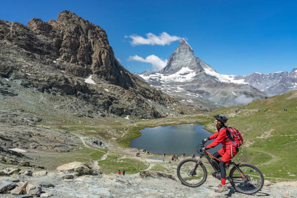 istock mountain biking in Zermatt, Switzerland 1162599882