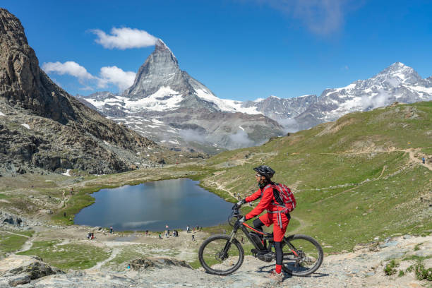 istock mountain biking in Zermatt, Switzerland 1162599913