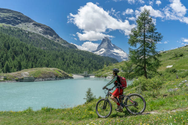 istock mountain biking in Zermatt, Switzerland 1162599926