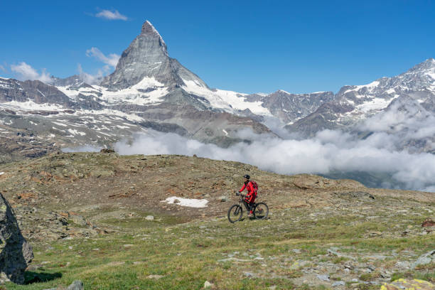 istock mountain biking in Zermatt, Switzerland 1162600046