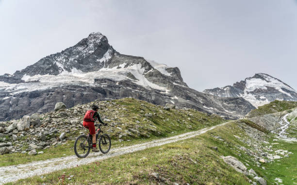 istock mountain biking in Zermatt, Switzerland 1162600233