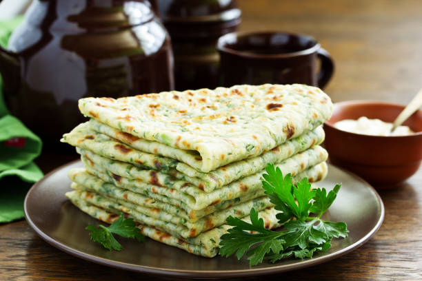 istock Pancakes with herbs and potatoes. 1162600826