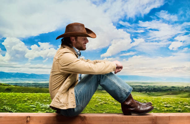 istock Handsome cowboy wearing denim jacket and jeans and cowboy hat 1162601172