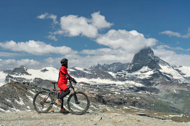 istock mountain biking in Zermatt, Switzerland 1162601316