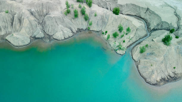istock Blue and green lakes among sand dunes and greenery. 1162602817