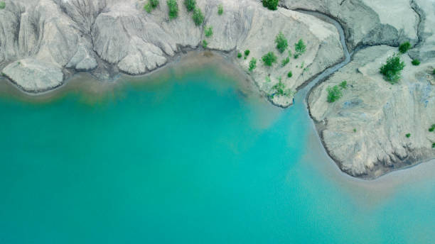 istock Blue and green lakes among sand dunes and greenery. 1162602947