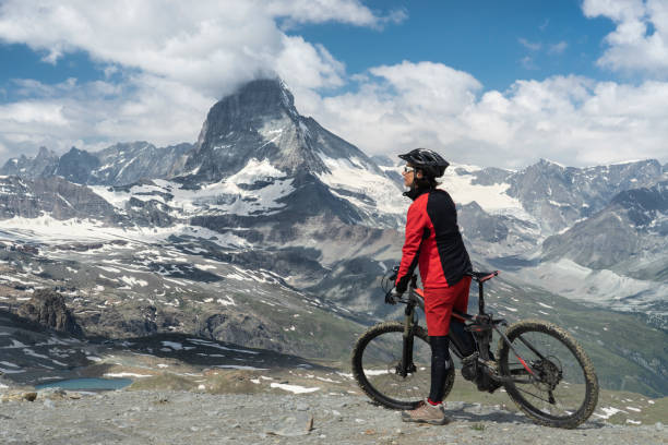 istock mountain biking in Zermatt, Switzerland 1162602956