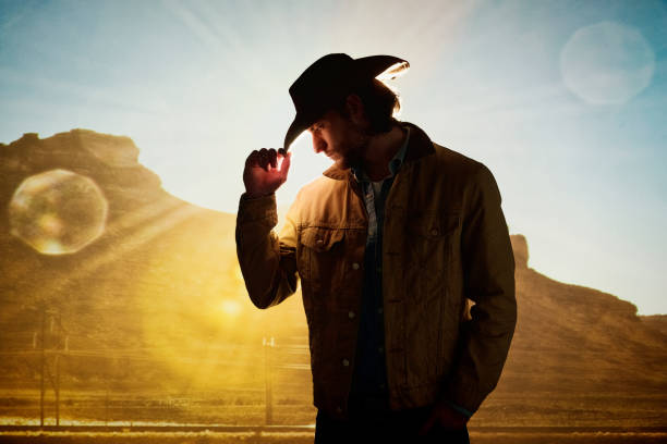 istock Mysterious cowboy in low lighting 1162602960
