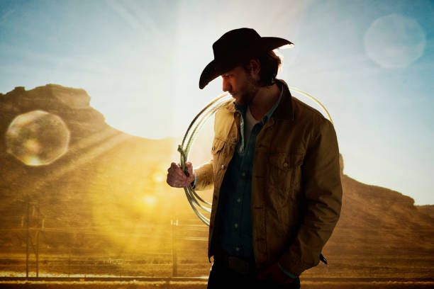 istock Mysterious cowboy in low lighting 1162603102