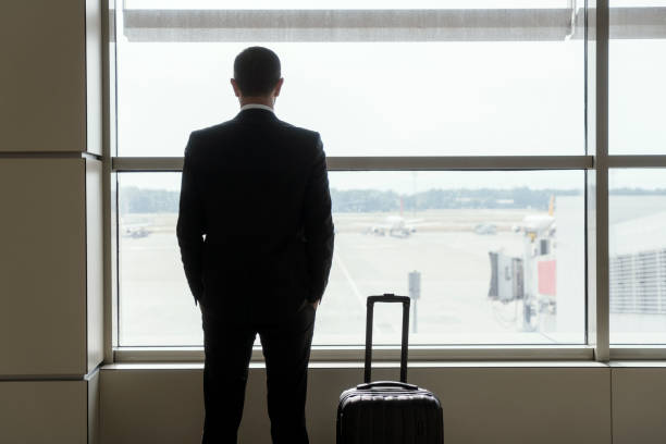 istock Businessman at airport 1162603315