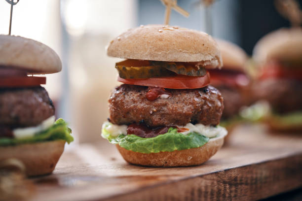 istock Mini Burgers with Tomato, Onion and Lettuce 1162604305