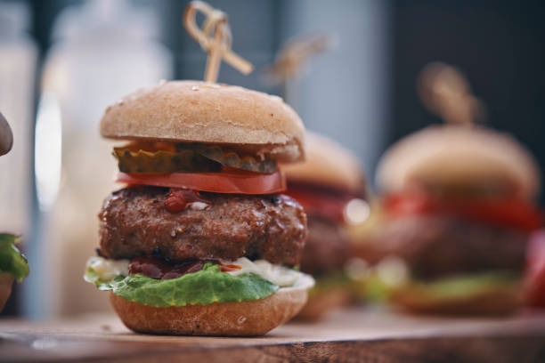 istock Mini Burgers with Tomato, Onion and Lettuce 1162604319