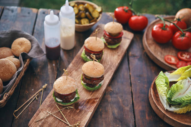 istock Mini Burgers with Tomato, Onion and Lettuce 1162604321