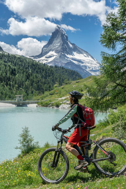 istock mountain biking in Zermatt, Switzerland 1162605649