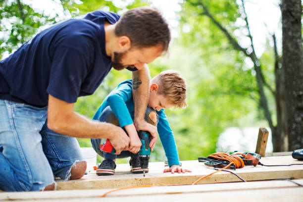 istock Father and son working togethe 1162605822