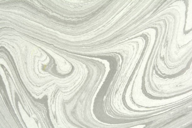 istock Mix of a white and black paint, closeup. Abstract marbling texture. Handmade ebru technique. 1162608281