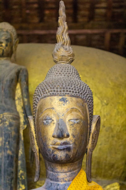 istock Buddha statue art in various temples in Laos. 1162608343