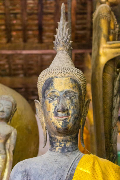 istock Buddha statue art in various temples in Laos. 1162608390