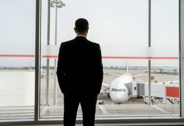 istock Businessman at airport 1162609427