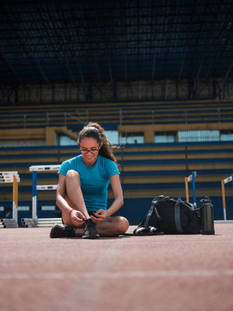 istock Excited young woman getting ready for training 1162609774