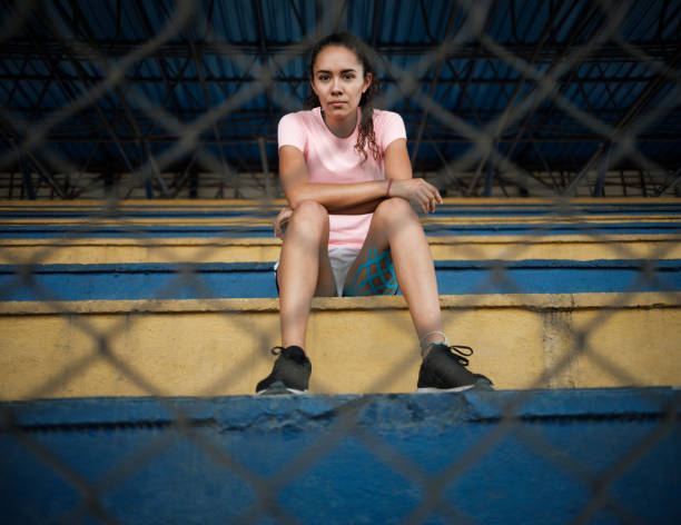 istock Serious young athlete looking at the camera 1162609859