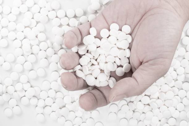 istock Suicide Pills,  Pills, tablets in dead man's hand by overdosing on medication. 1162610594