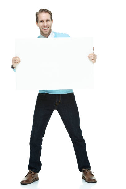 istock Handsome man wearing a sweater and neck tie and jeans 1162613578
