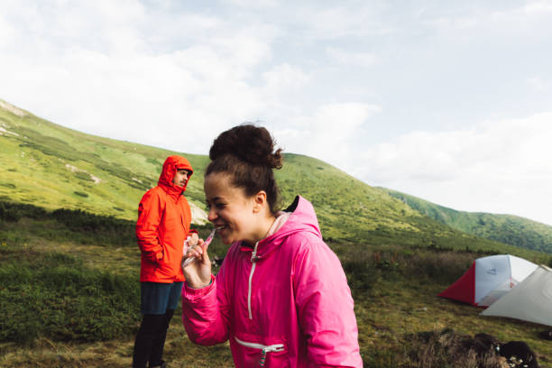 istock Woman brushing teeth in the mountains 1162613671