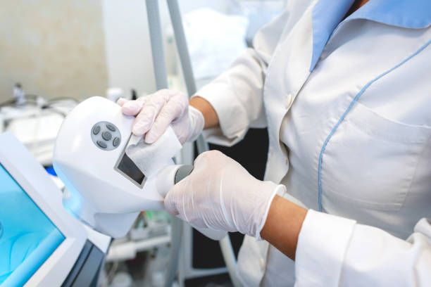 Beautician Cleaning and Sterilizing Equipmet Before Using it stock photo