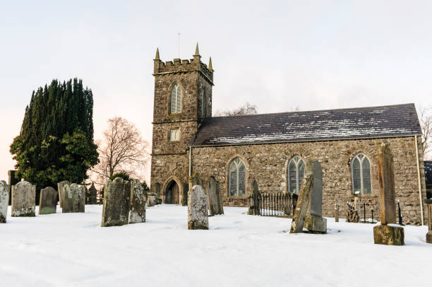 Church and graveyard covered in snow, Northern Ireland