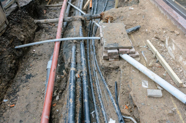istock Exposed electrical, gas and telecommunications cables, and water pipes during road and footpath works. 1162615849