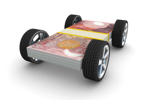 istock Car Wheels New Zealand Dollar Bills 1162620264