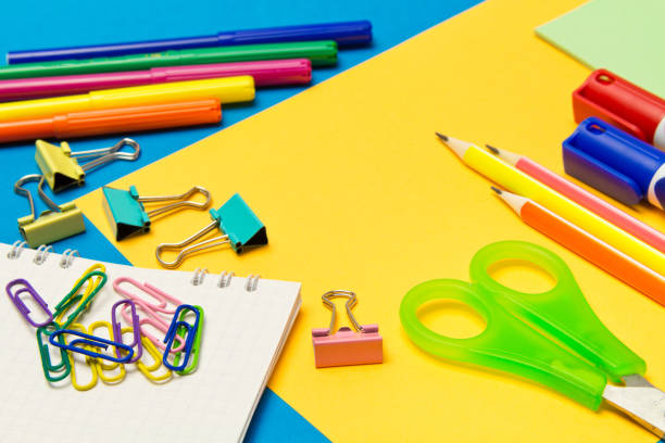 istock Stationery. School and office supplies on a colored background. Selective focus 1162620425