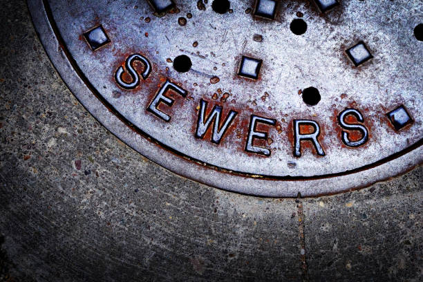 Sewer manhole cover maintenance iron steel access to utility