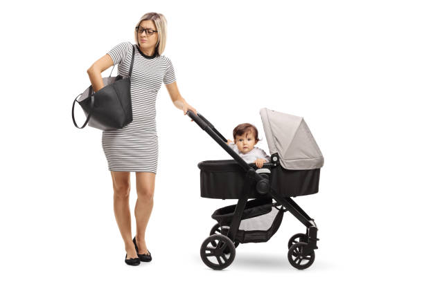 istock Mother with a baby in a stroller searching a handbag 1162624327