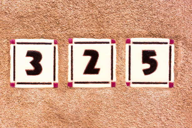 istock Ceramic Number 325 Street Address Tiles; Brown Wall 1162625411