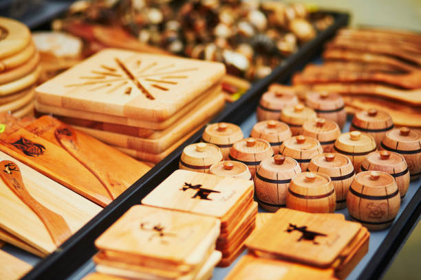 Traditional Finnish wooden decorations and kitchen ustensils on market in Helsinki, Finland