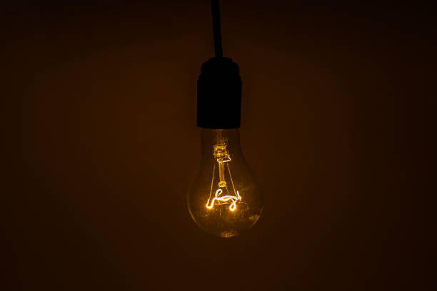 istock Old vintage bulb light in the dark 1162625835