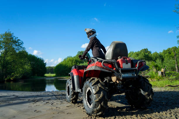 istock ATV in nature. Quad bike rides. 1162626461
