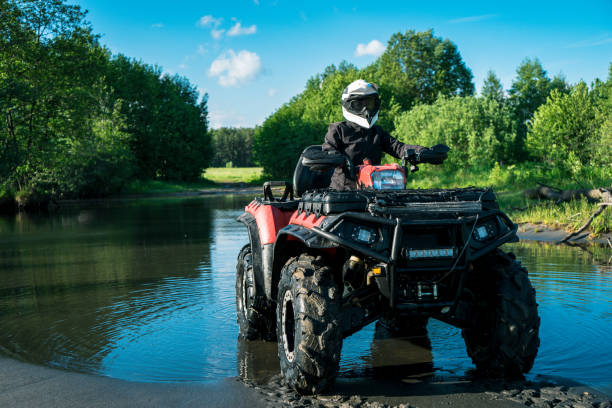 istock ATV in nature. Quad bike rides. 1162626462