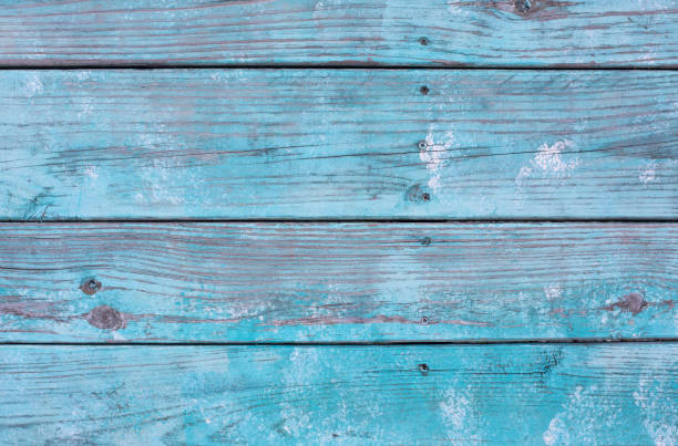 istock Turquoise Peeling Wood Plank Background 1162628063