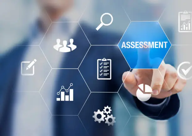 Photo of Assessment and analysis by professional auditing consultant concept, person touching screen with icons of risk evaluation, business analytics, quality compliance, process inspection, financial audit