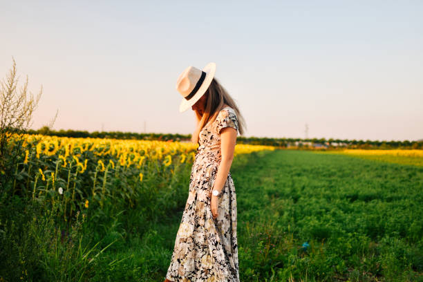 istock Beautiful woman in a meadow 1162629887