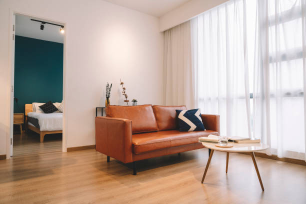 istock A modern and simple living room with sofa and table 1162635833