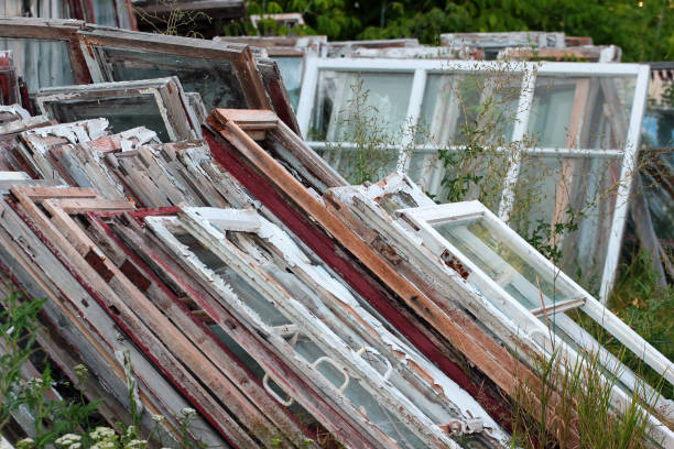 istock Piles of old wooden frames and windows 1162636853