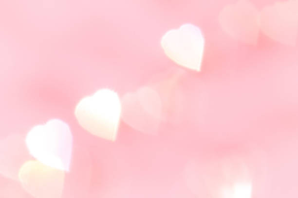 istock Heart flare on a gently pink background 1162643506