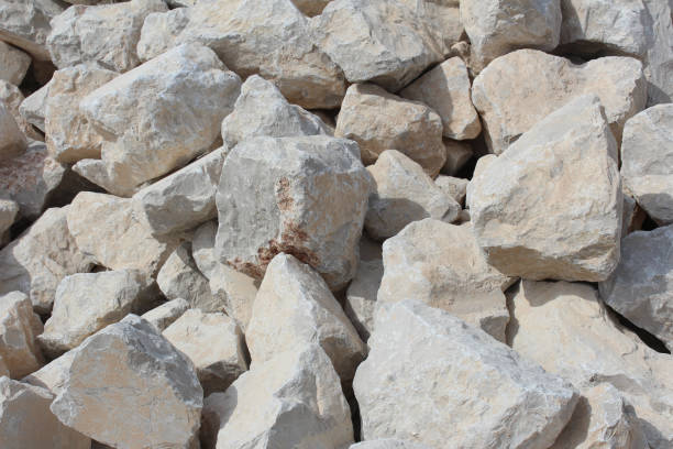 istock Pile of building stones background 1162643555