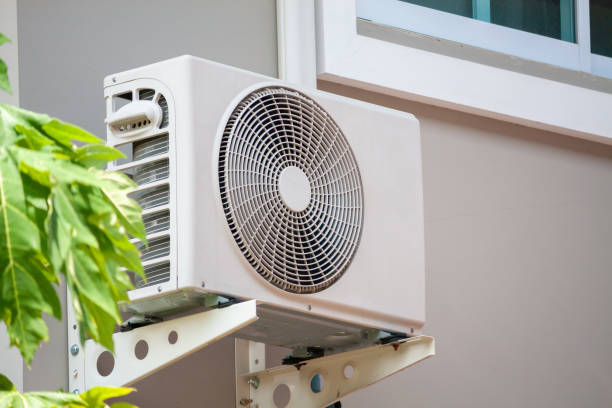 istock Air conditioner compressor outdoor unit installed outside the house 1162646985