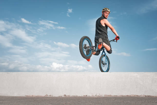 istock bike trial. training. stunt. extreme. 1162647881