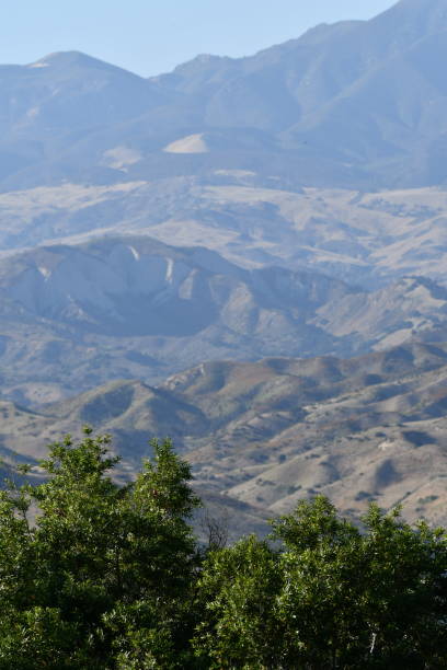 istock Coastal Mountain Range with Haze and Trees 1162650689